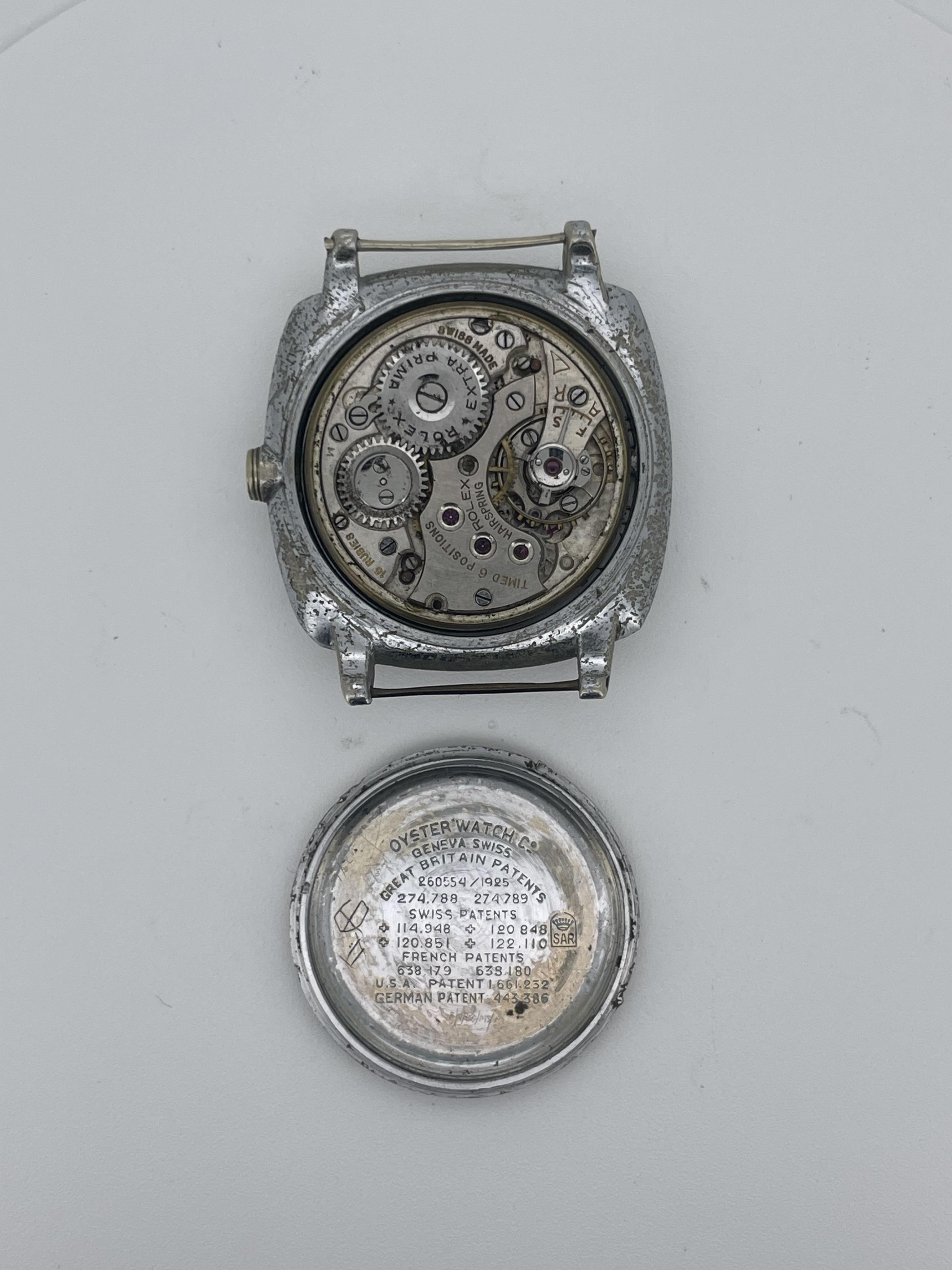 A gentleman’s 1930’s Rolex Oyster Ultra Prima chrome cased manual wind wrist watch, with Arabic dial, subsidiary seconds and cushion case, lacking winding crown and strap, case diameter 30mm.